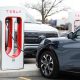 ford mustang mach-e plugged into a tesla supercharger